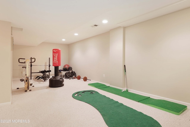 workout area featuring baseboards, visible vents, recessed lighting, and carpet