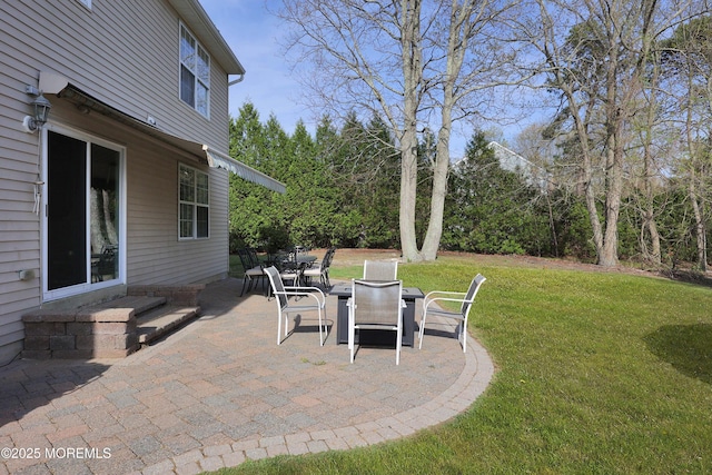 view of patio featuring outdoor dining area