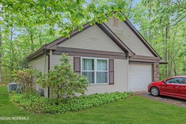 578 Petunia Ln N, Whiting, NJ 08759 - view of side of property with driveway, a yard, central AC unit, and an attached garage