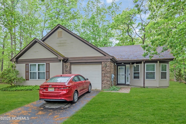 578 Petunia Ln N, Whiting, NJ 08759 - ranch-style house featuring driveway, an attached garage, a front yard, and brick siding