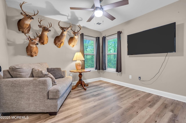 578 Petunia Ln N, Whiting, NJ 08759 - living area with wood finished floors, baseboards, and ceiling fan