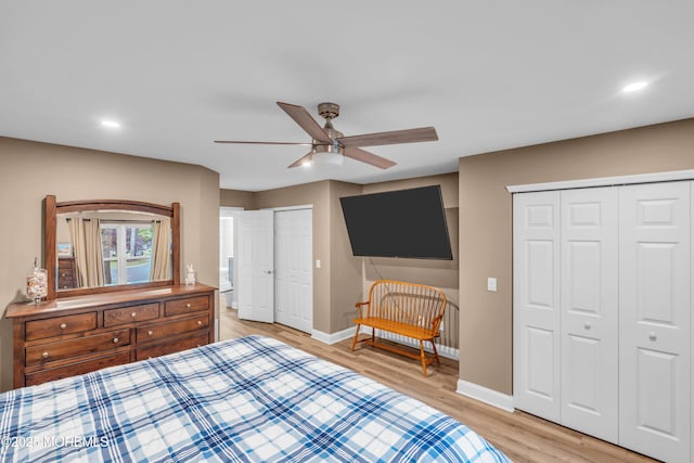 578 Petunia Ln N, Whiting, NJ 08759 - bedroom featuring two closets, light wood-type flooring, baseboards, recessed lighting, and a ceiling fan