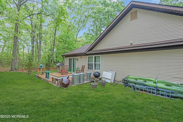 578 Petunia Ln N, Whiting, NJ 08759 - rear view of house featuring a deck and a yard