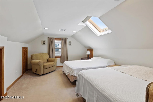 bedroom with a skylight, baseboards, vaulted ceiling, and light colored carpet