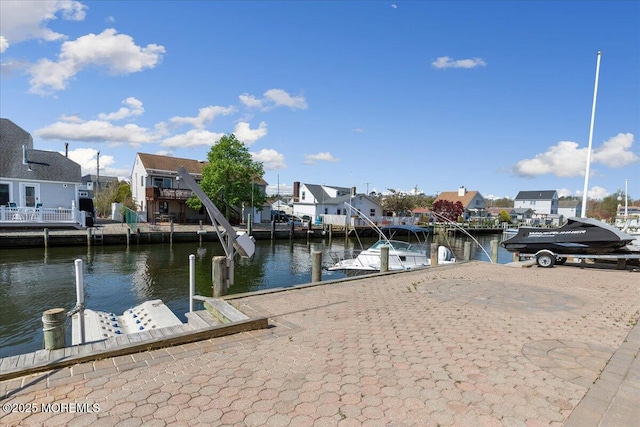 dock with a water view and a residential view