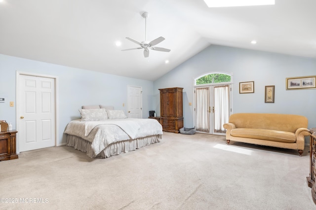 bedroom featuring carpet, vaulted ceiling, and ceiling fan