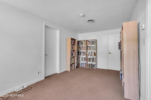 unfurnished room with carpet flooring
