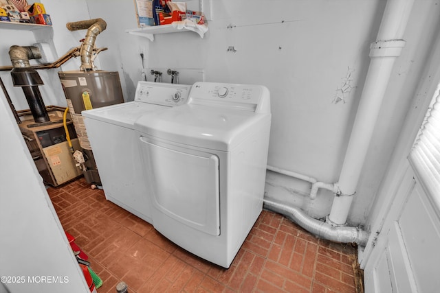 washroom with separate washer and dryer, gas water heater, and brick patterned flooring