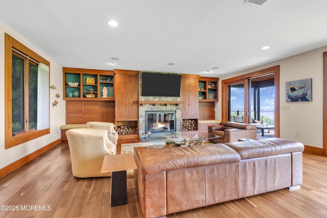 154 Ocean Blvd, Atlantic Highlands, NJ 07716 - living area with baseboards, a stone fireplace, light wood-style flooring, and recessed lighting