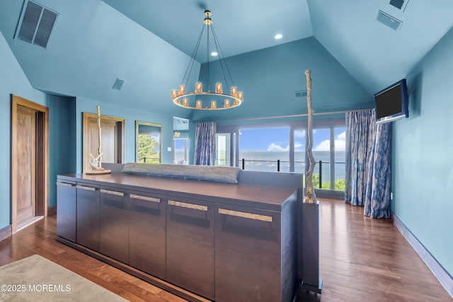 154 Ocean Blvd, Atlantic Highlands, NJ 07716 - kitchen with baseboards, dark wood-style floors, a chandelier, hanging light fixtures, and high vaulted ceiling