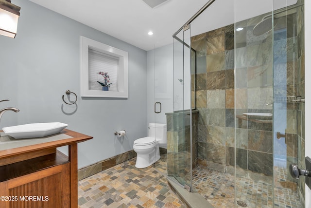 154 Ocean Blvd, Atlantic Highlands, NJ 07716 - full bathroom featuring toilet, baseboards, a shower stall, recessed lighting, and stone finish floors