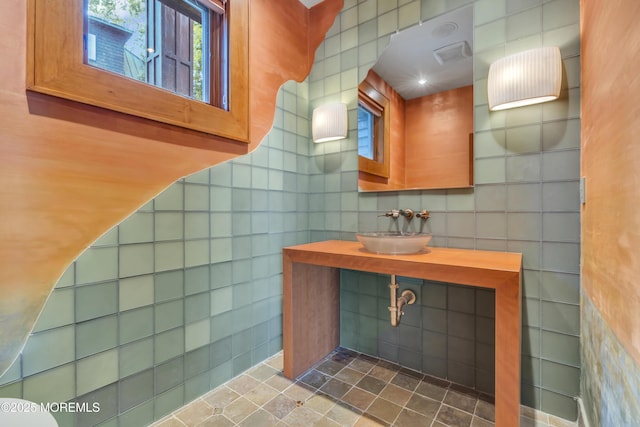 154 Ocean Blvd, Atlantic Highlands, NJ 07716 - bathroom with a sink, tile walls, and tile patterned flooring