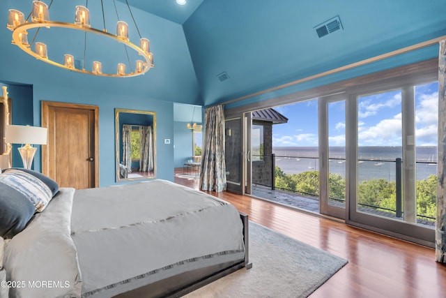 154 Ocean Blvd, Atlantic Highlands, NJ 07716 - bedroom featuring a chandelier, wood finished floors, high vaulted ceiling, and a water view