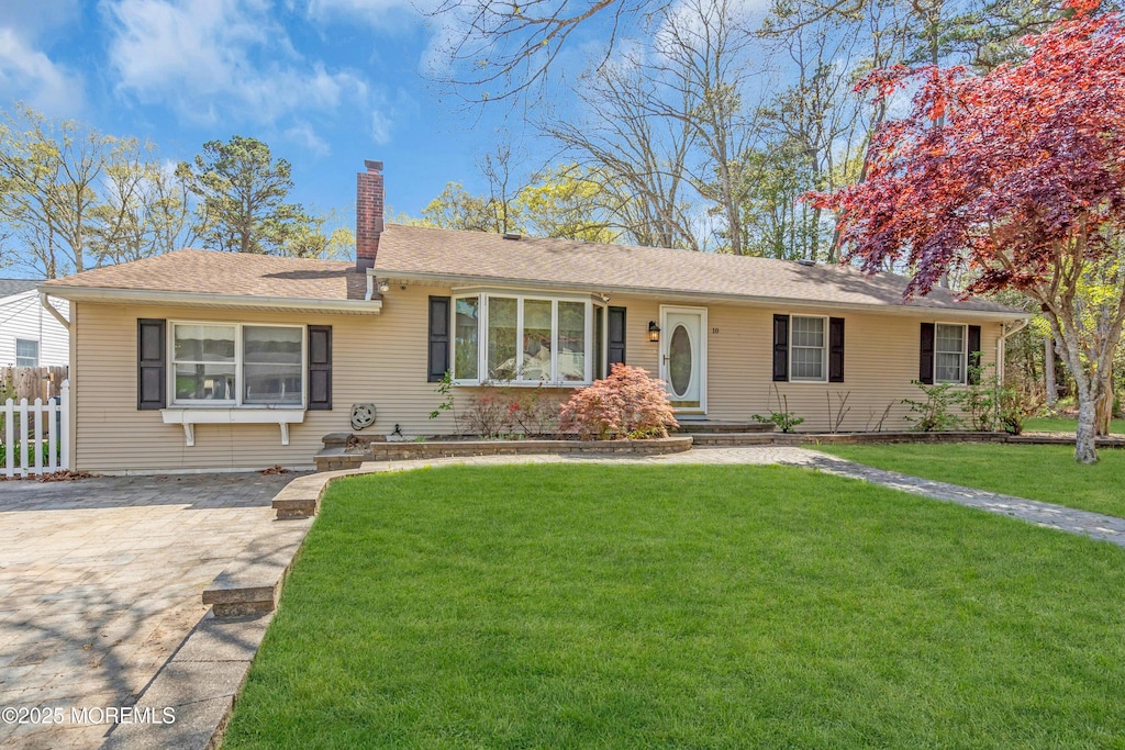 10 Clayhole Rd, Little Egg Harbor, NJ 08087 - ranch-style home featuring fence, a chimney, and a front yard