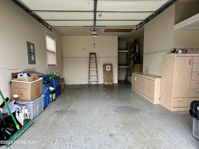 1 Lagos Ct, Toms River, NJ 08757 - garage with electric panel and a garage door opener