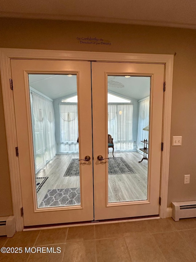 1 Lagos Ct, Toms River, NJ 08757 - doorway with french doors, a baseboard heating unit, and tile patterned flooring
