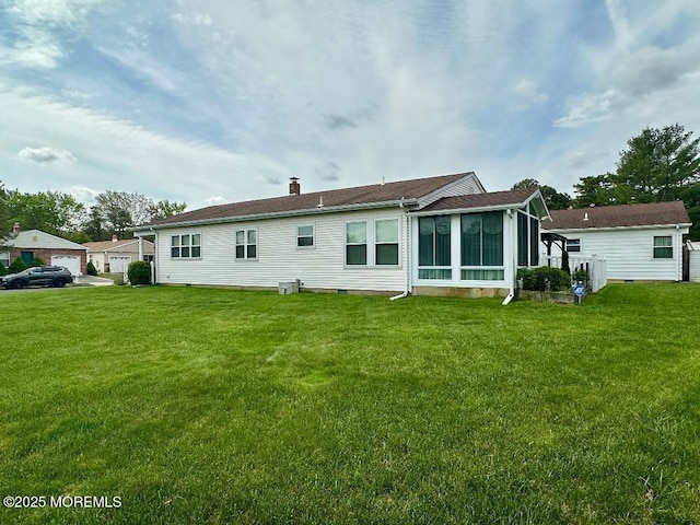 1 Lagos Ct, Toms River, NJ 08757 - rear view of property with a yard, a chimney, and a sunroom