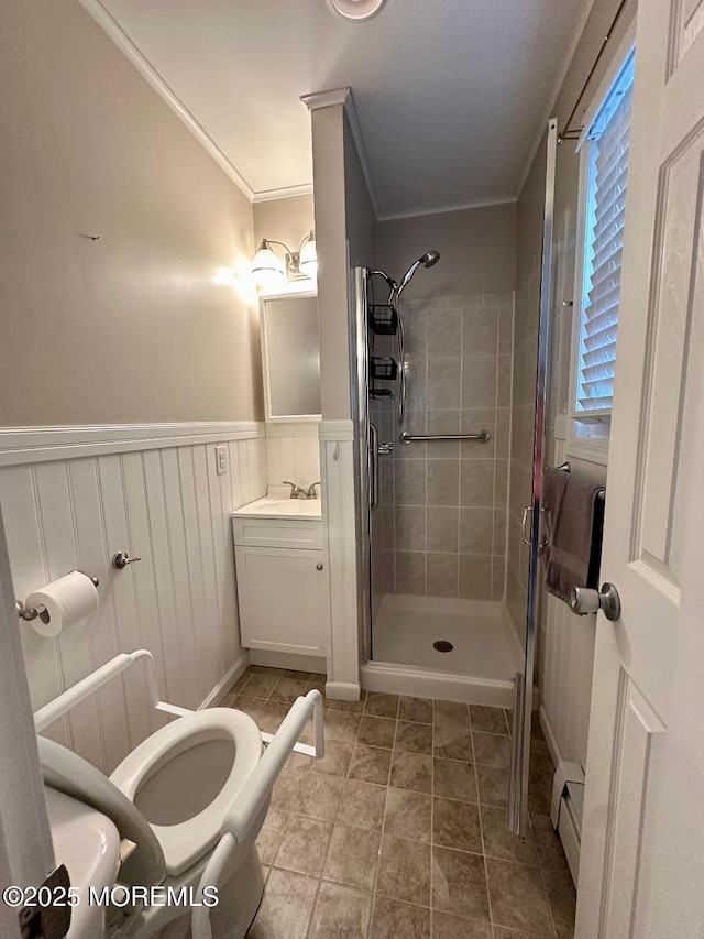 1 Lagos Ct, Toms River, NJ 08757 - bathroom with a stall shower, ornamental molding, vanity, wainscoting, and a baseboard radiator