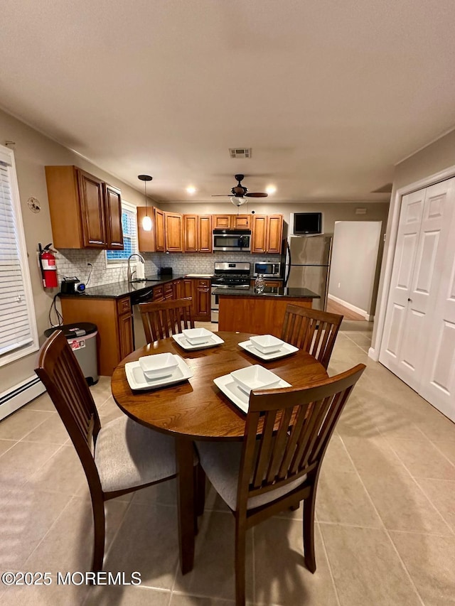 1 Lagos Ct, Toms River, NJ 08757 - dining area featuring light tile patterned floors, recessed lighting, and a ceiling fan