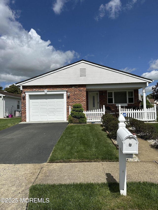 1 Lagos Ct, Toms River, NJ 08757 - ranch-style home featuring brick siding, driveway, a garage, and covered porch