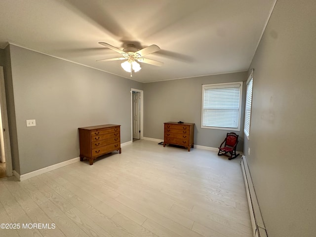 1 Lagos Ct, Toms River, NJ 08757 - unfurnished bedroom featuring a baseboard radiator, light wood finished floors, and a ceiling fan