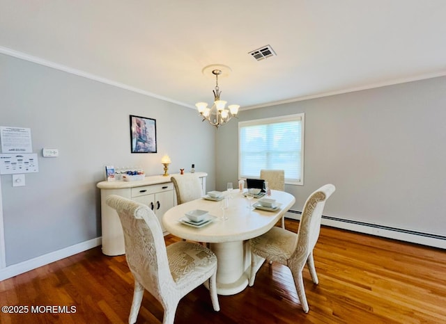 1 Lagos Ct, Toms River, NJ 08757 - dining area featuring a chandelier, crown molding, wood finished floors, and a baseboard heating unit