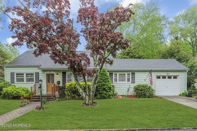 1601 Chestnut Ave, Ocean Twp, NJ 07712 - view of front of property featuring an attached garage, concrete driveway, a front yard, and a shingled roof