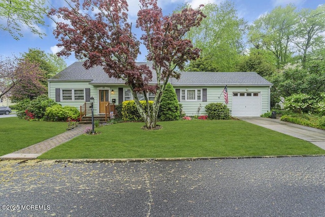 1601 Chestnut Ave, Ocean Twp, NJ 07712 - view of front of home with an attached garage, driveway, and a front yard