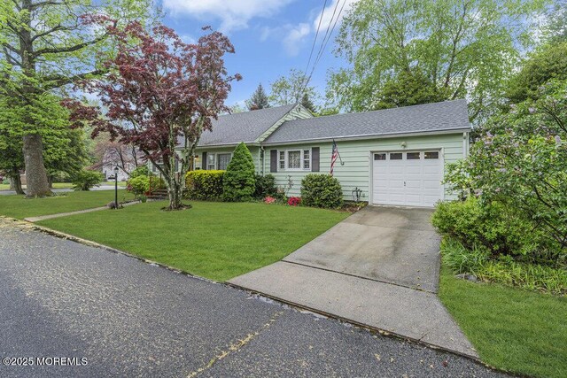1601 Chestnut Ave, Ocean Twp, NJ 07712 - single story home with an attached garage, driveway, a front lawn, and a shingled roof