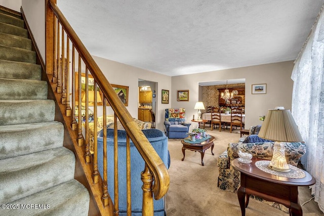 1601 Chestnut Ave, Ocean Twp, NJ 07712 - living room featuring carpet flooring, a chandelier, stairs, and a textured ceiling