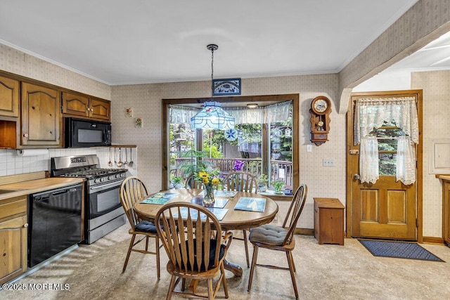 1601 Chestnut Ave, Ocean Twp, NJ 07712 - dining space with wallpapered walls, light colored carpet, crown molding, and baseboards