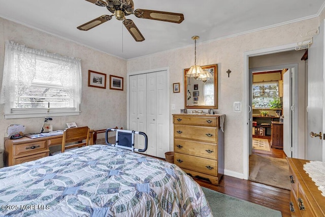 1601 Chestnut Ave, Ocean Twp, NJ 07712 - bedroom with wood finished floors, a closet, ornamental molding, a ceiling fan, and baseboards