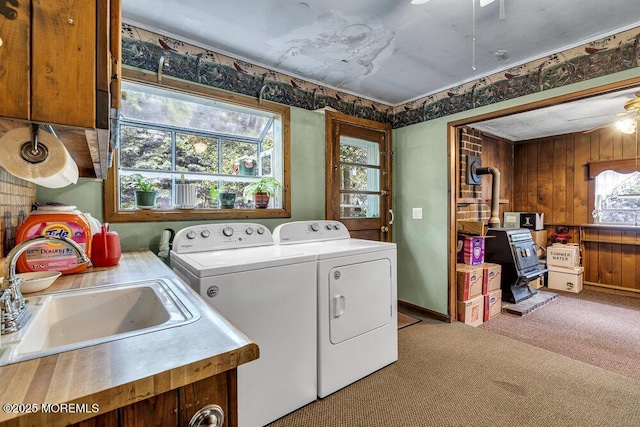 1601 Chestnut Ave, Ocean Twp, NJ 07712 - laundry room with washing machine and clothes dryer, light colored carpet, and wooden walls