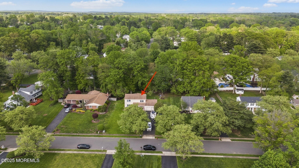 12 Dickinson Ln, Manalapan, NJ 07726 - aerial view of property's location featuring a heavily wooded area and nearby suburban area