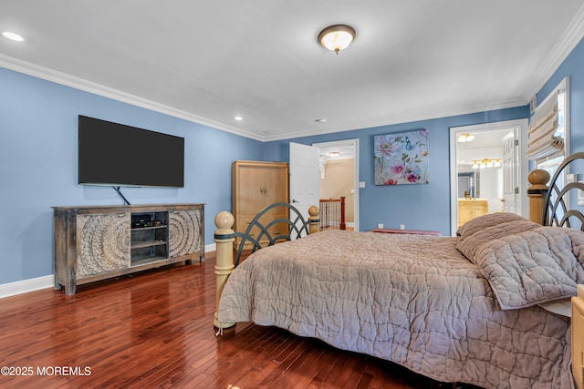 bedroom with crown molding, hardwood / wood-style flooring, baseboards, recessed lighting, and ensuite bath