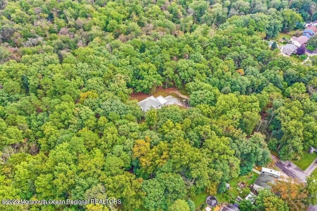 2557 Huckleberry Rd, Manchester, NJ 08759 - aerial view of property and surrounding area with a heavily wooded area