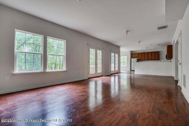 2557 Huckleberry Rd, Manchester, NJ 08759 - unfurnished living room featuring dark wood-style floors and baseboards