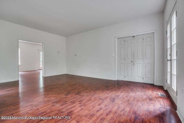 2557 Huckleberry Rd, Manchester, NJ 08759 - spare room featuring wood finished floors and healthy amount of natural light
