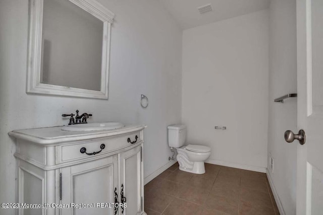 2557 Huckleberry Rd, Manchester, NJ 08759 - bathroom with toilet, baseboards, tile patterned floors, and vanity