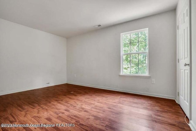 2557 Huckleberry Rd, Manchester, NJ 08759 - empty room featuring wood finished floors and baseboards