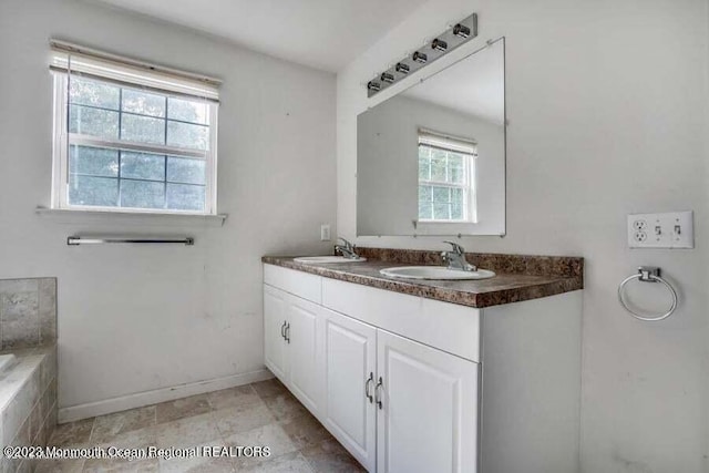 2557 Huckleberry Rd, Manchester, NJ 08759 - full bath with baseboards and double vanity