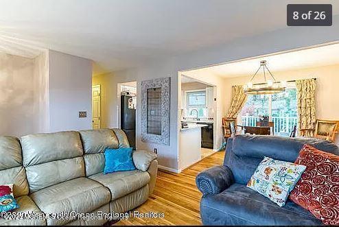 living room featuring light wood-style floors