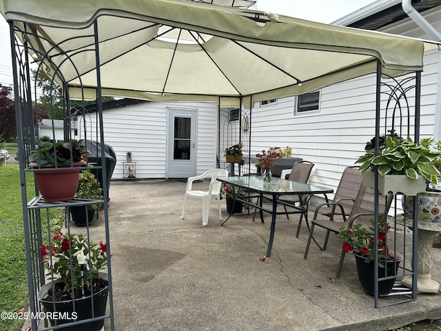view of patio with outdoor dining area