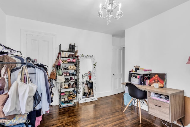 office space featuring a chandelier and wood finished floors