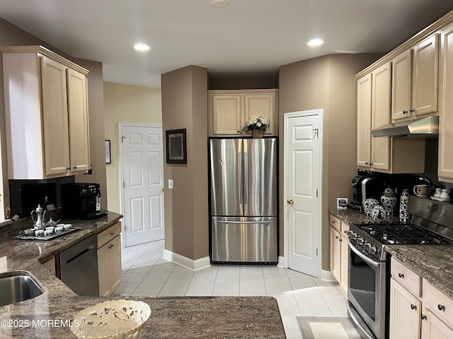 27 Stonehenge Ct, Jackson, NJ 08527 - kitchen featuring appliances with stainless steel finishes, light tile patterned flooring, under cabinet range hood, dark stone counters, and recessed lighting