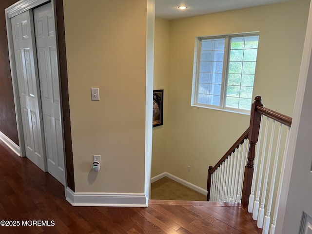 27 Stonehenge Ct, Jackson, NJ 08527 - hallway with an upstairs landing, dark wood-style floors, and baseboards