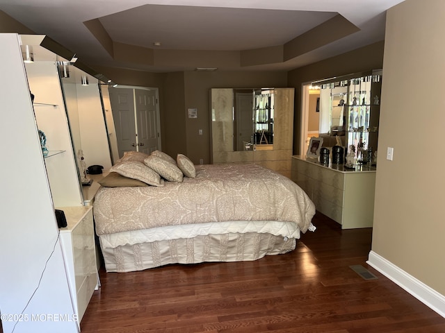 27 Stonehenge Ct, Jackson, NJ 08527 - bedroom featuring wood finished floors, baseboards, and a raised ceiling