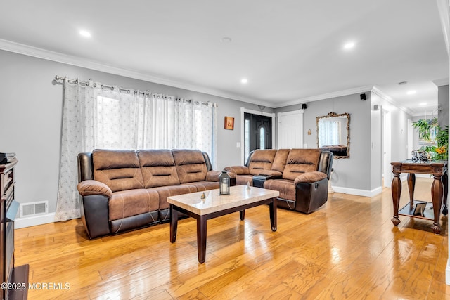 1012 Bismarck St, Toms River, NJ 08757 - living room featuring light wood-type flooring, baseboards, crown molding, and recessed lighting