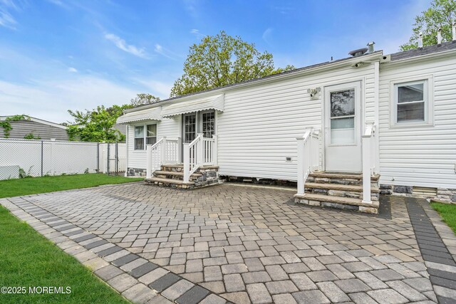 1012 Bismarck St, Toms River, NJ 08757 - rear view of property featuring entry steps and a patio area