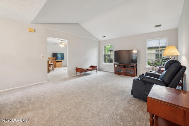 119 Morning Glory, Whiting, NJ 08759 - living area featuring light colored carpet, vaulted ceiling, baseboards, and ceiling fan